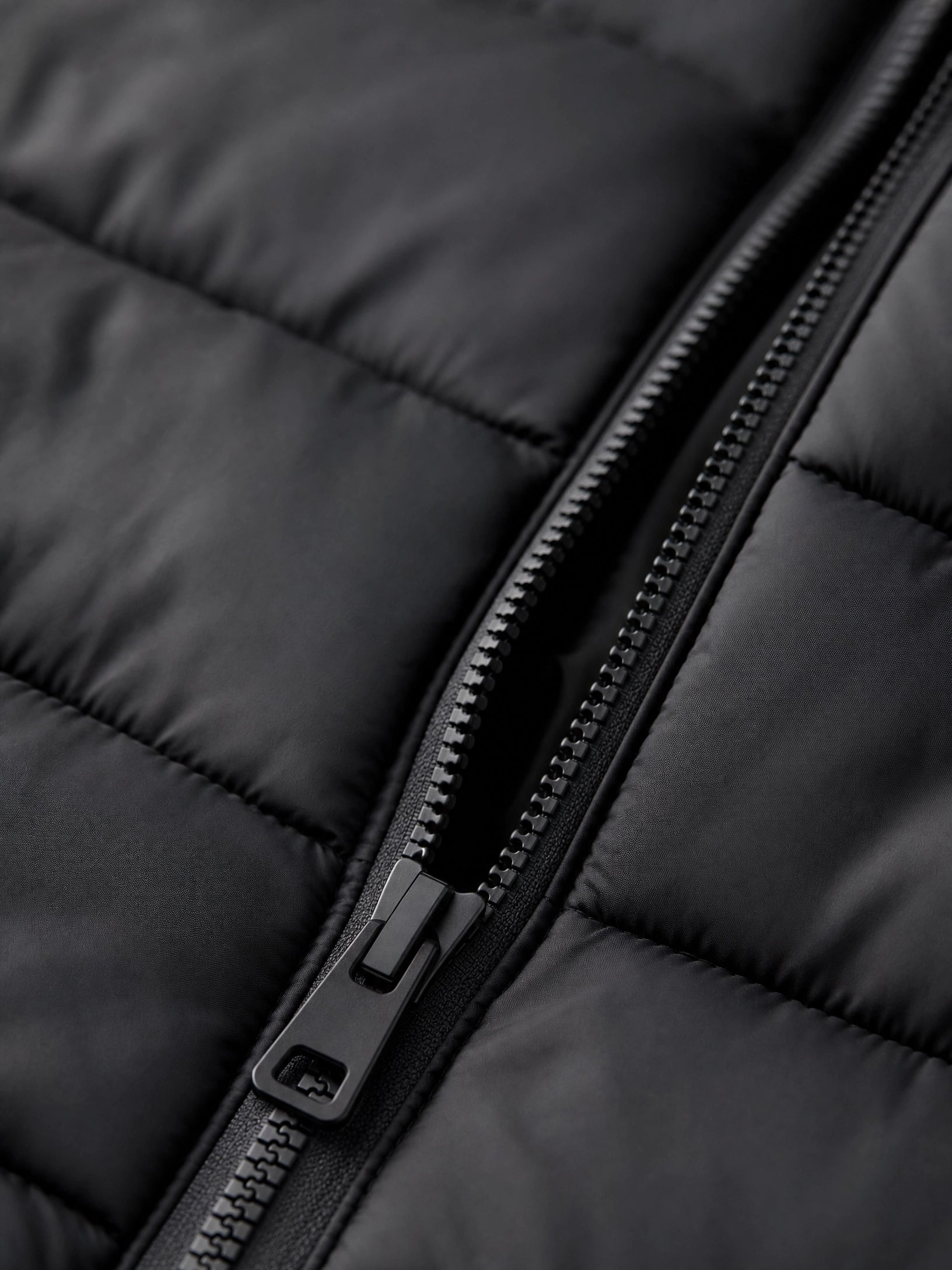 black hooded puffer vest Averly London hood detail
