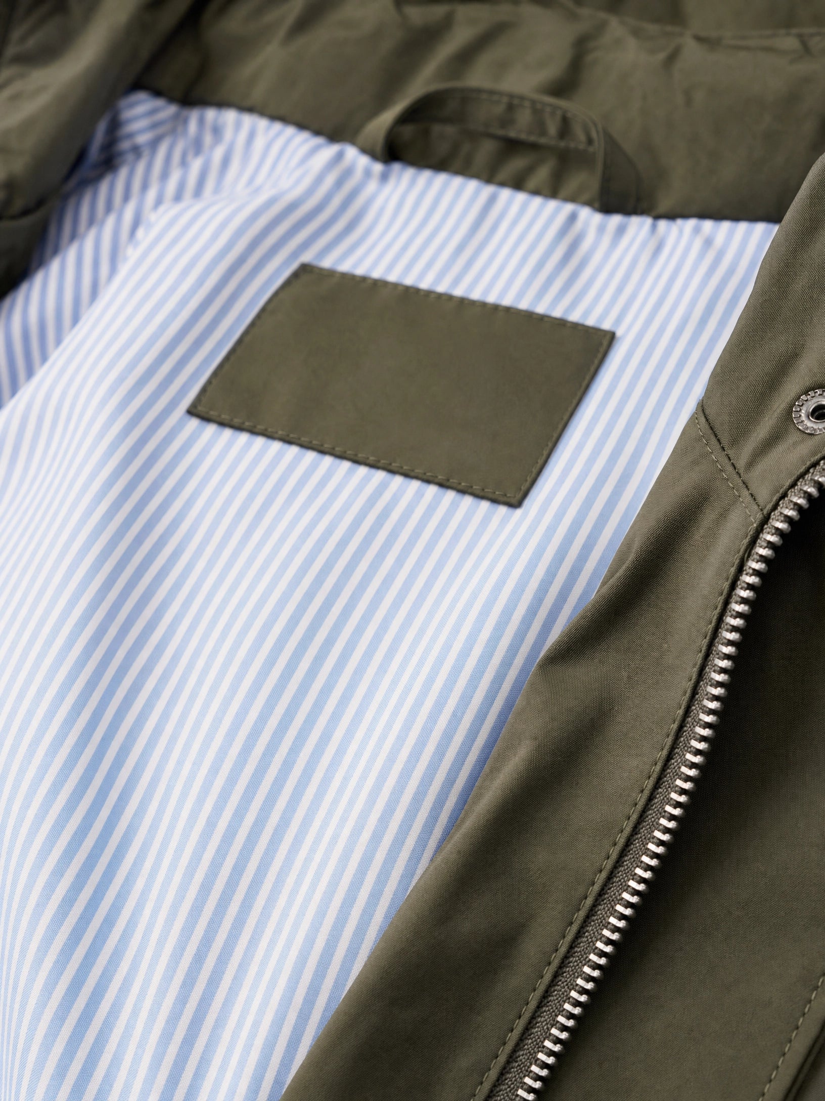 green waterproof trench coat detachable hood Averly London hood detail